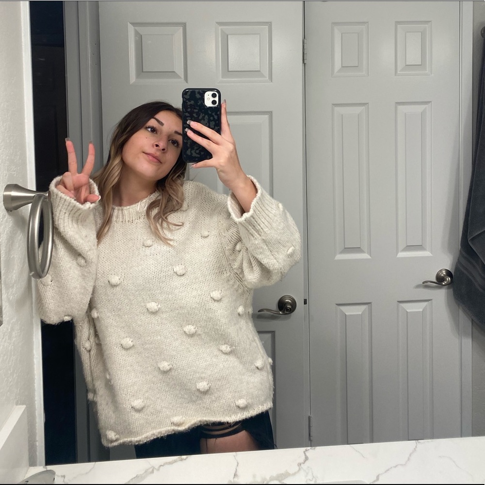 white sweater